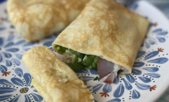 Konvertiki iz omletnyh blinov s syrom i shpinatom 7cfc84b.webp